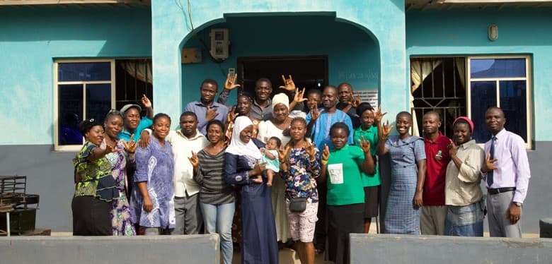 A mother and children receiving support from the foundation
